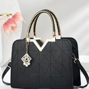 Chic Black Satchel with Gold Detailing